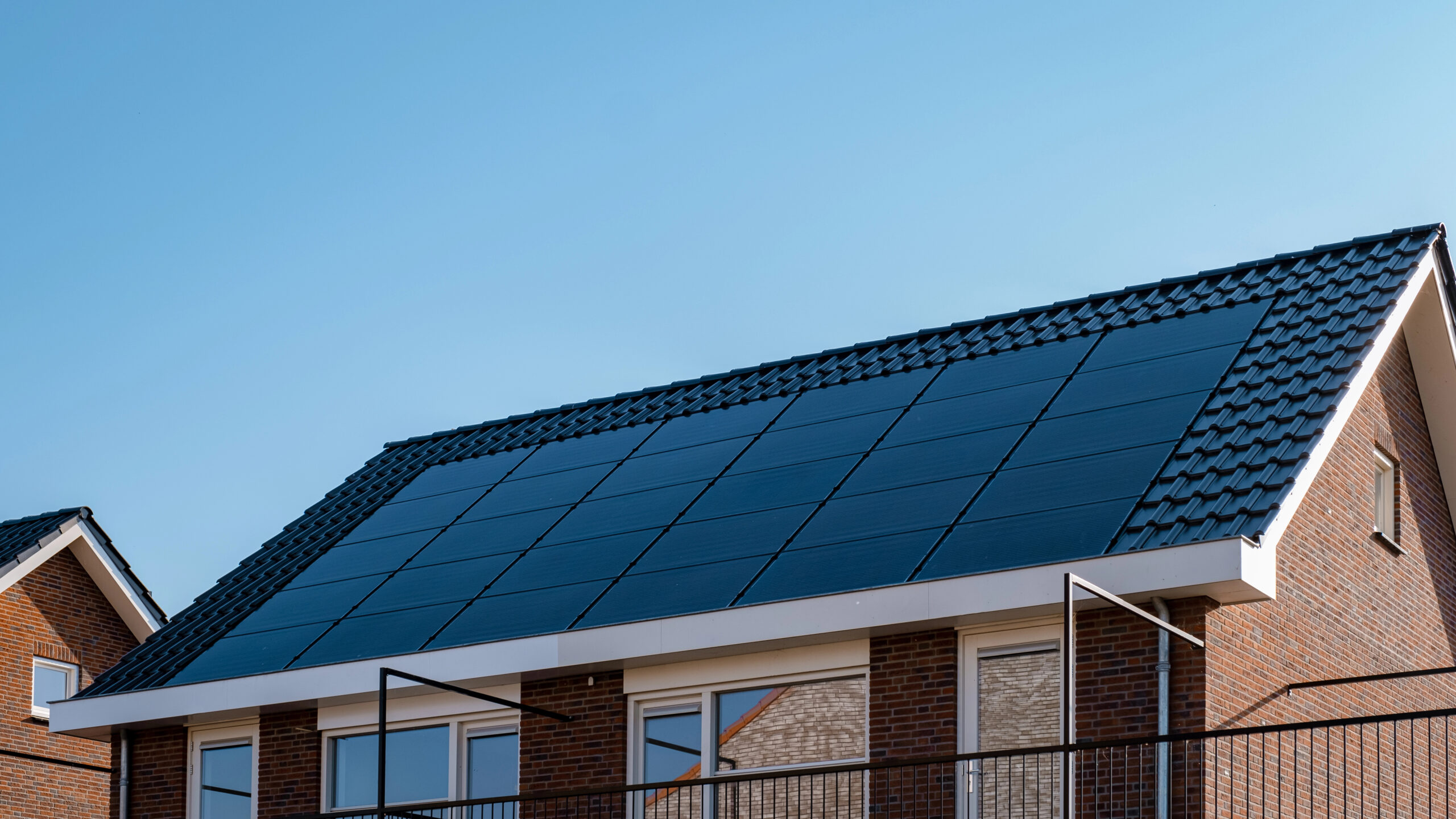 modern house roof with solar panels 2026